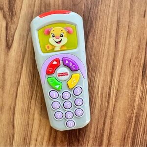 Fisher-Price Pretend TV Remote Baby Toy with Lights Music and Learning
